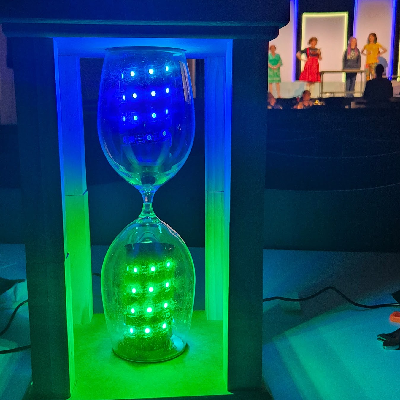 Wireless DMX-over-WiFi hourglass theatre prop with addressable LEDs